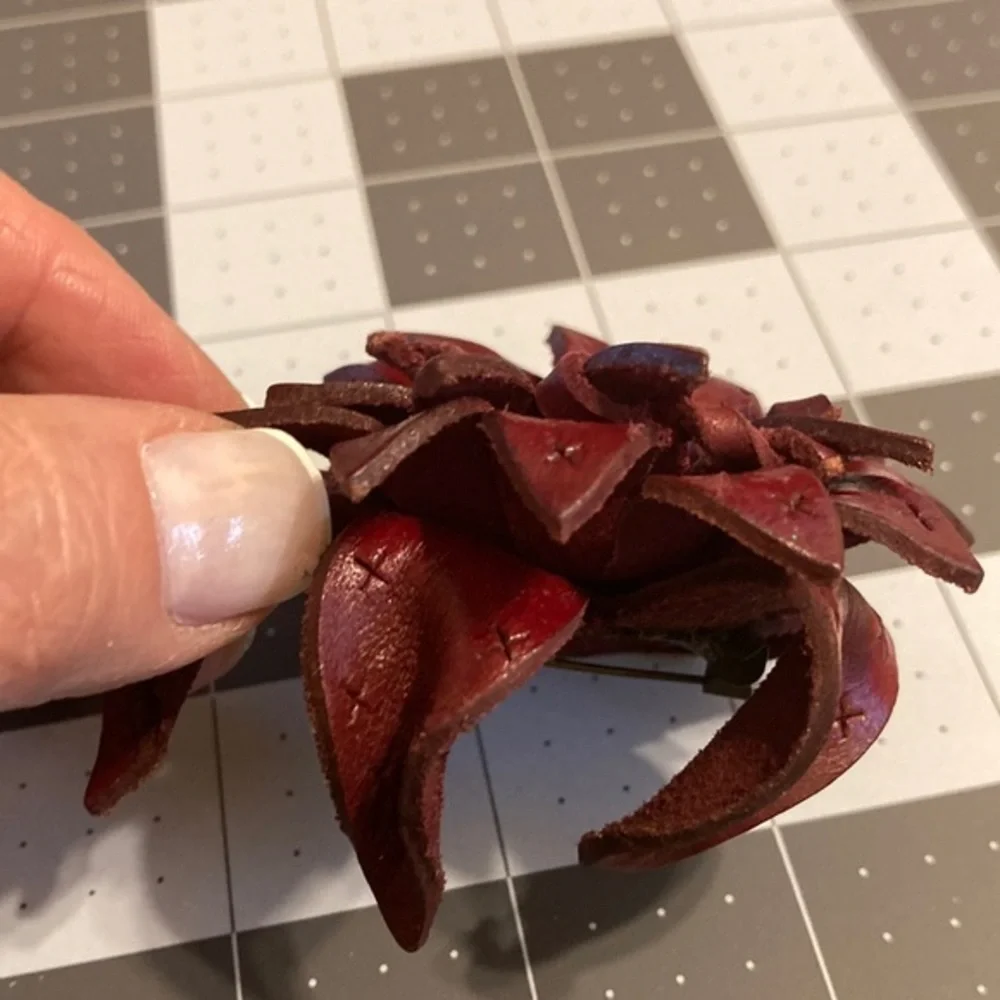 NWOT burgundy tooled leather layered petaled floral brooch